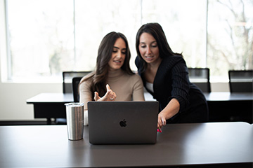 two students in a Pepperdine Graziadio class
